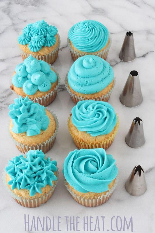 Adorable blue frosted cupcake with a swirl and colorful sprinkles