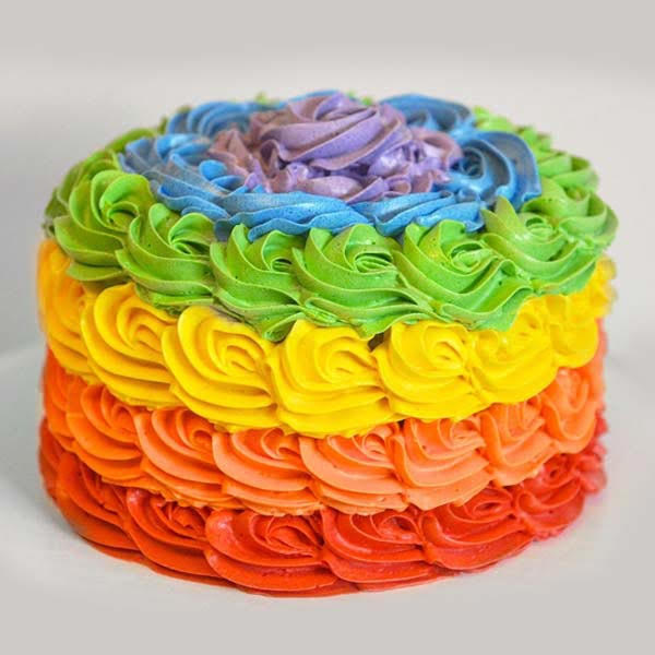 Vibrant rainbow layer cake celebrating pride and joy